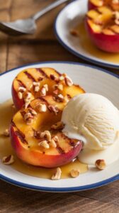 This grilled peach dessert is a simple yet elegant treat that will elevate any summer gathering on a quiet evening at home.