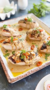 This savory chicken with dried apricots features tender pieces of chicken cooked with sweet dried apricots, making it a delicious dinner.