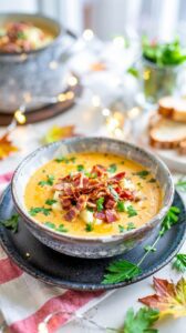 This classic potato soup is a comforting and delicious dish perfect for fall, made with simple ingredients like potatoes, onions, and cream.