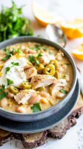 This creamy slow cooker white chicken chili is a delicious comforting dish that combines tender chicken, white beans, and a blend of spices.