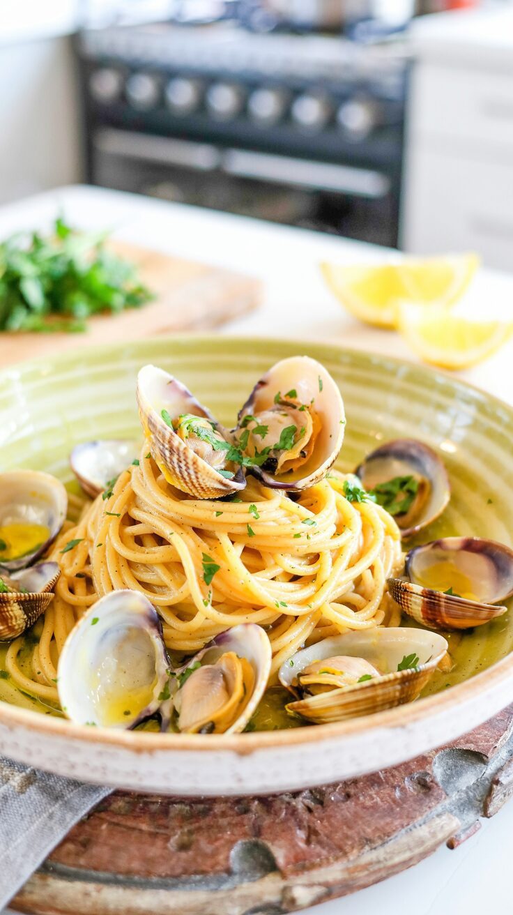Spaghetti alle Vongole Bianchi - Transport yourself to the shores of Italy with every delightful bite of Spaghetti alle Vongole Bianchi.
