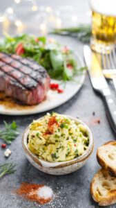 This zesty cowboy butter is a flavorful twist on traditional garlic herb butter, combining the richness of butter with fresh herbs and garlic.