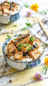 This Baked Teriyaki Tofu is a delicious and satisfying vegan dish that showcases the rich flavors of teriyaki sauce and is delicious on top.