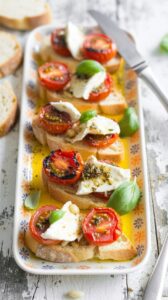 This roasted tomato and burrata dish is a delightful appetizer that showcases the rich flavors of slow roasted tomatoes and burrata cheese.